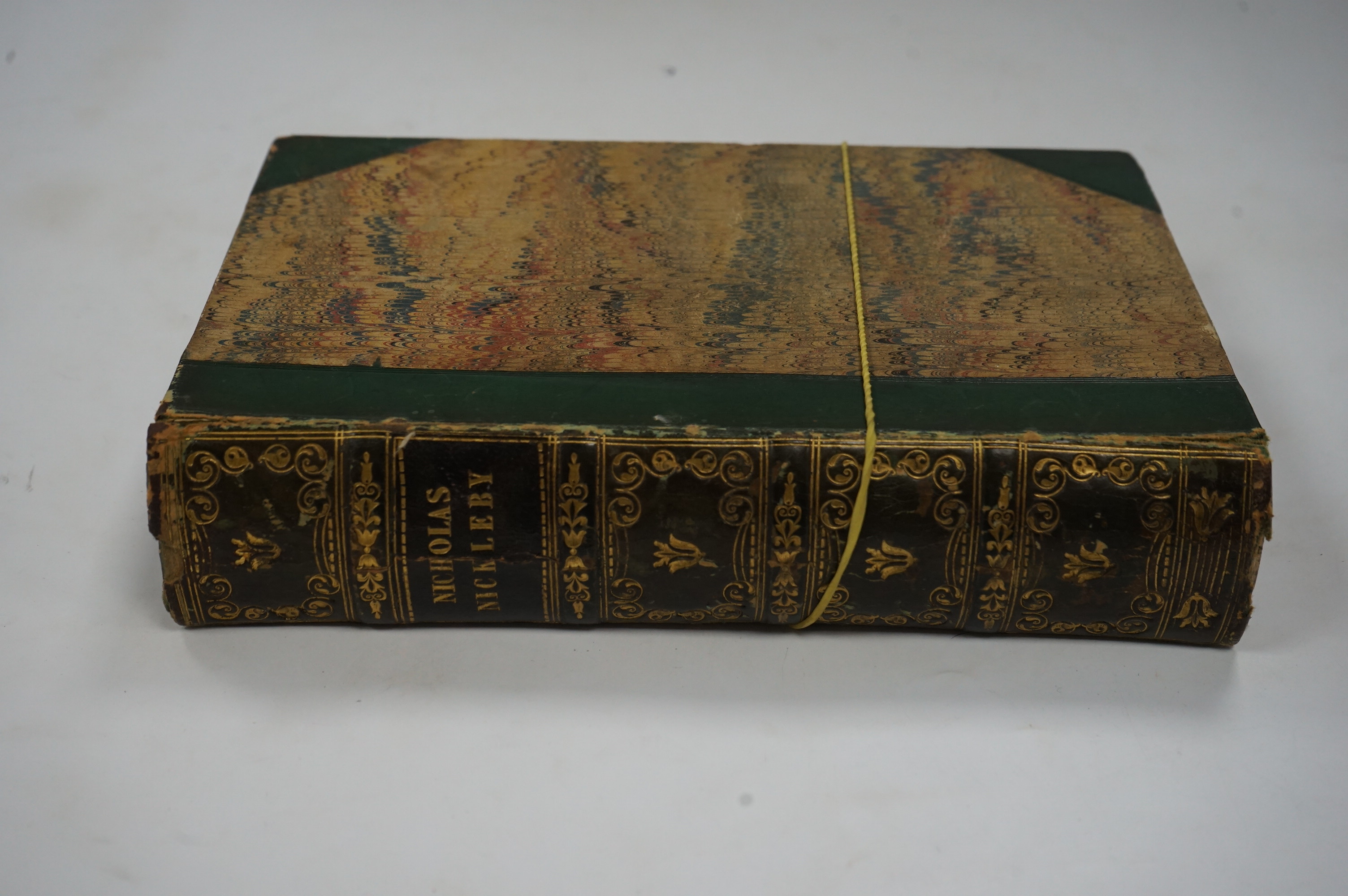 Dickens, Charles - The Life and Adventures of Nicholas Nickleby. First Edition. portrait frontis. of the author, 39 plates (by Phiz, i.e. H.K. Browne); near contemp. half calf and marbled boards, gilt decorated and panel